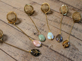 Gold Wire-Wrapped Teardrop Gemstone Tea Ball Infuser - Golden colored tea ball with gold wire wrapped tree on crystal stone tear pendant