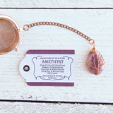 Handmade rose gold copper color tea ball infuser for loose leaf tea with teardrop shaped purple amethyst gemstone crystal wire wrapped with copper wire into tree of life design - includes tag with associations and properties of the stone